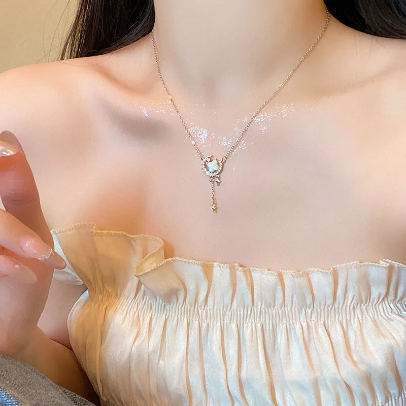 Women's star moon necklace with zirconium stones on adjustable copper chain in gold finish