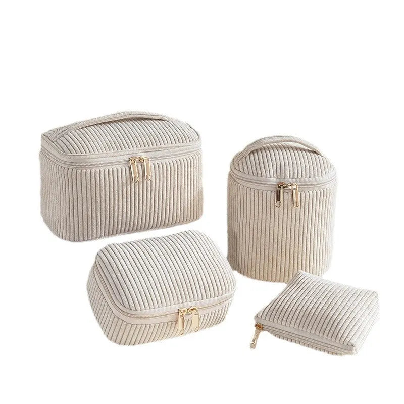Flannelette makeup bag four-piece set in blue with dots pattern, showing cube-style polyester bags