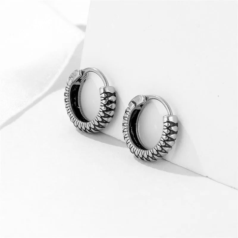 Silver geometric retro twist earrings with striped pattern made from stainless steel alloy