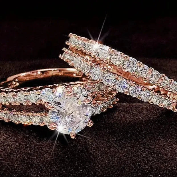2-in-1 fully-jewelled female ring set in geometric design with round elements, shown in silver, gold and rose gold finishes