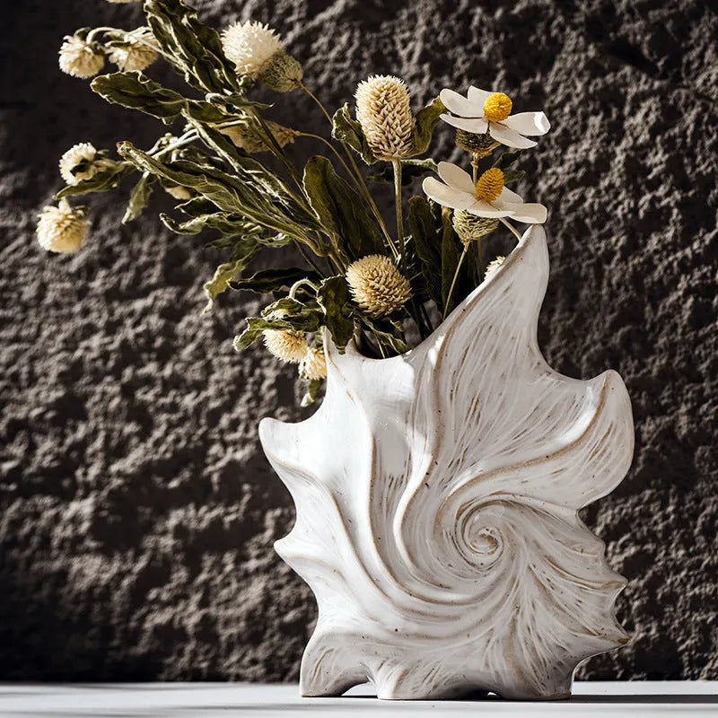 European style ceramic vase with coloured glaze finish and hexagonal base design