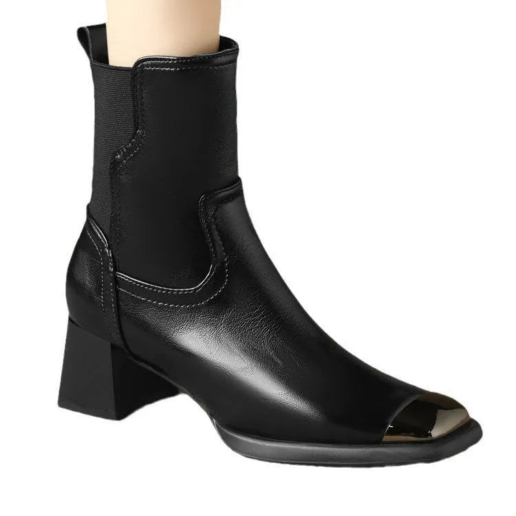 Brown women's knee-high cowhide leather Martin boots with a heel and side zipper detail.