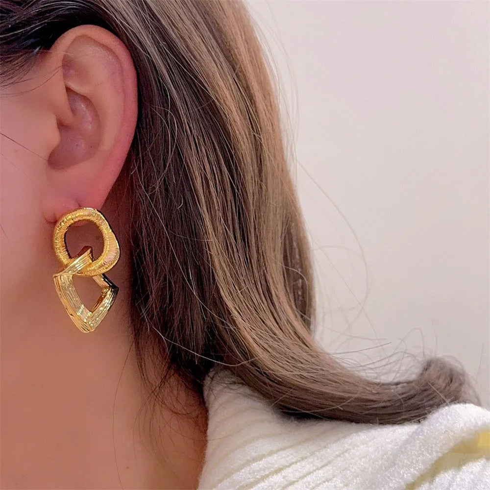 Gold retro geometric circle drop earrings for women, 3.4cm long.