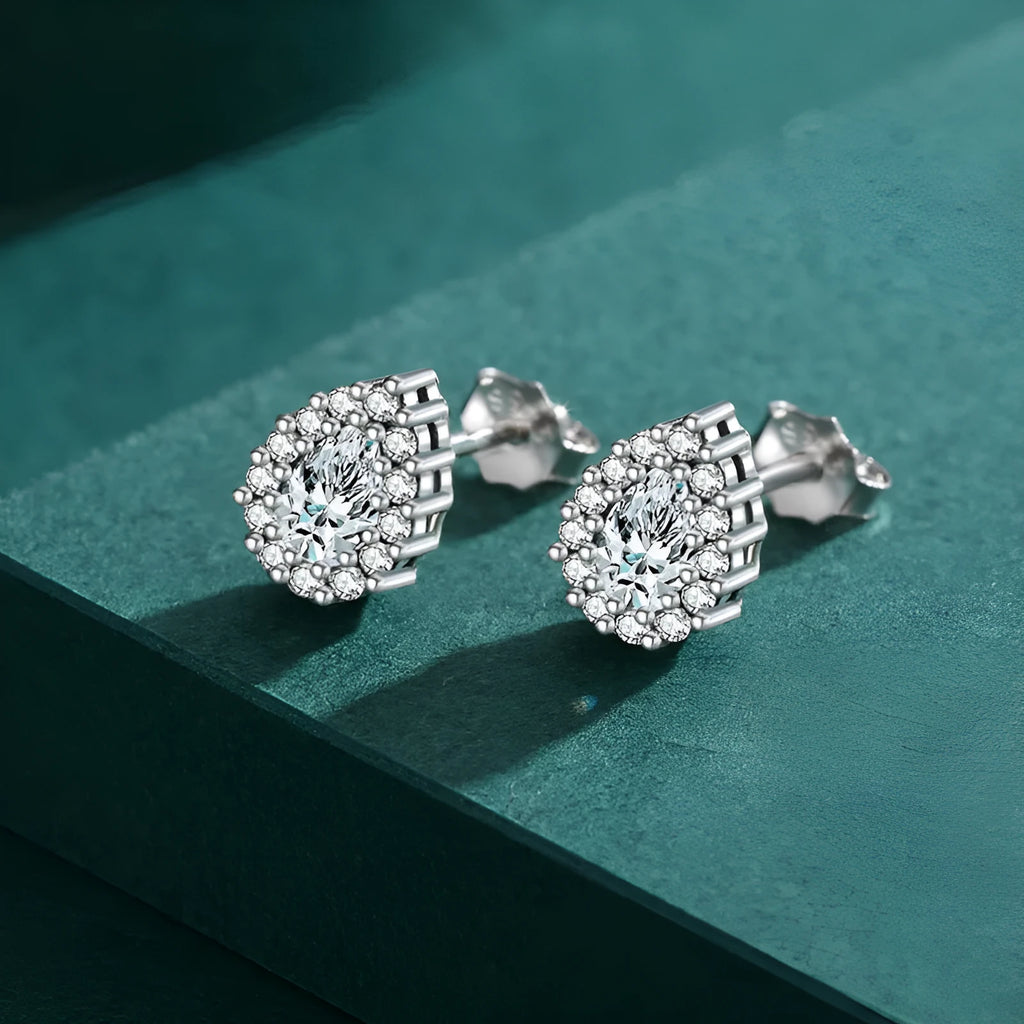 Silver drop shape ear studs made from 925 sterling silver with diamond-treated finish