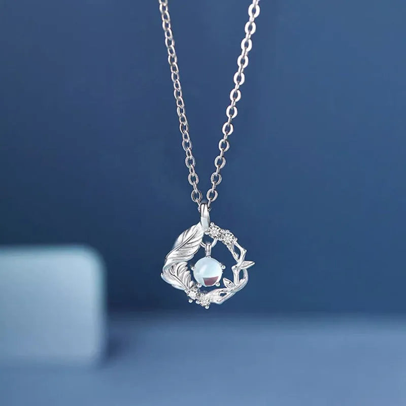 Women's geometric alloy pendant necklace with tree and bird design on adjustable chain