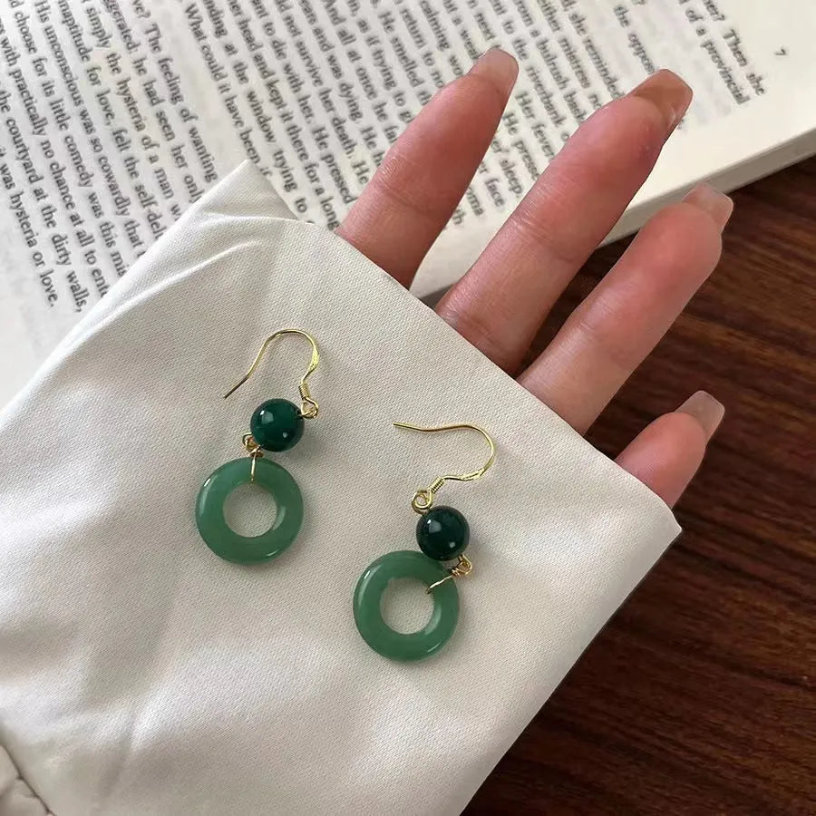 Green jade design earrings with peace buckle shape in Chinese style geometric form