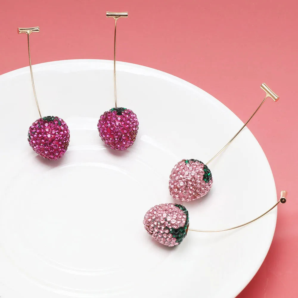 Geometric red strawberry stud earrings with spot-drill texture on a zinc alloy charm.