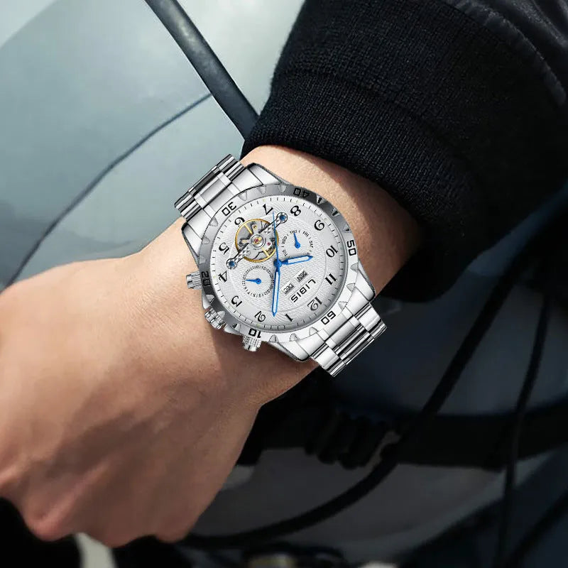 Men's silver automatic perpetual calendar watch with stainless steel bracelet and sapphire crystal glass.