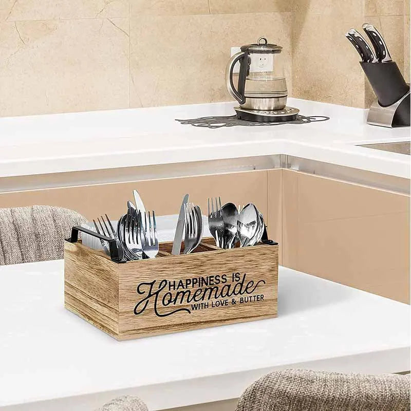 Wooden kitchen storage box with internal grid dividers for organising utensils.