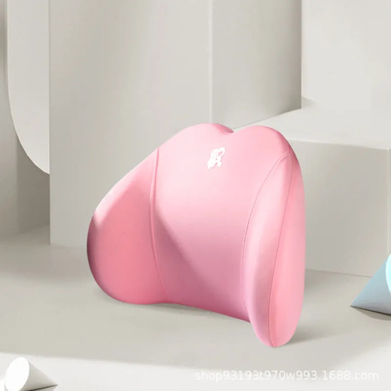 Heart-shaped car pillow in choice of colours, shown as headrest and lumbar support on a car seat.