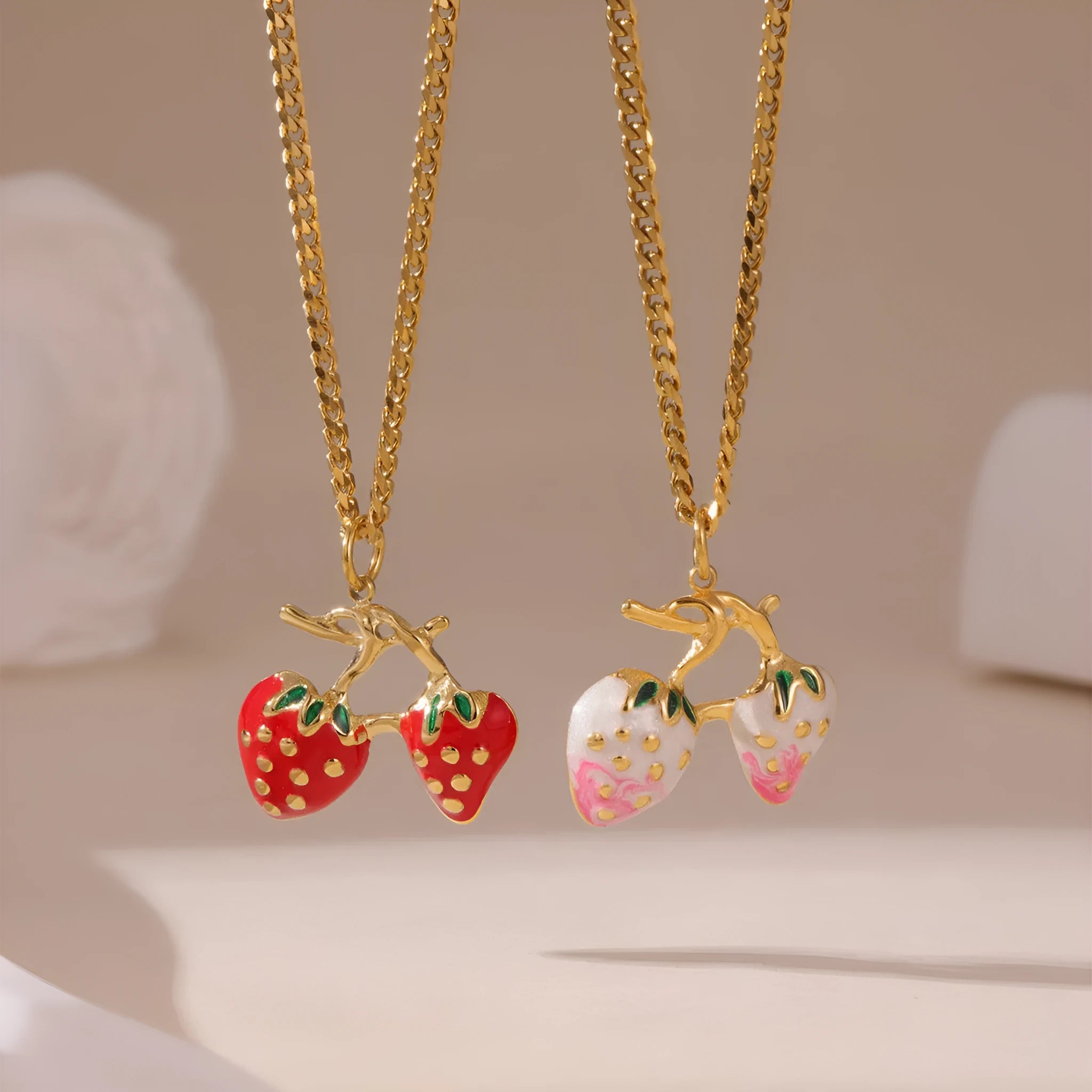 Stainless steel necklace with a strawberry fruit pendant in red or white gradient finish