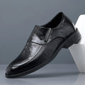 Slip-on cowhide leather men's shoe in black with rubber sole, side view, sizes 38-44