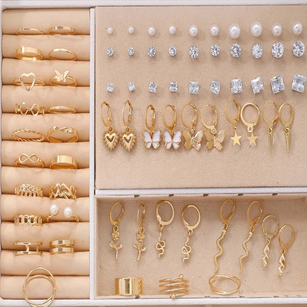 108 geometric pearl earrings in gold and yellow electroplated alloy arranged in combination set