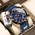 Men's chronograph sports watch with a black silicone strap and silver alloy case on a wrist.