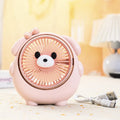 Cute dog-shaped plastic desktop electric fan in light pink puppy colour, with USB cable.