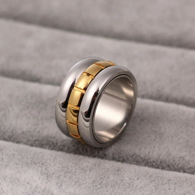 Ultra-wide gold titanium steel knuckle ring with rotating band on hand