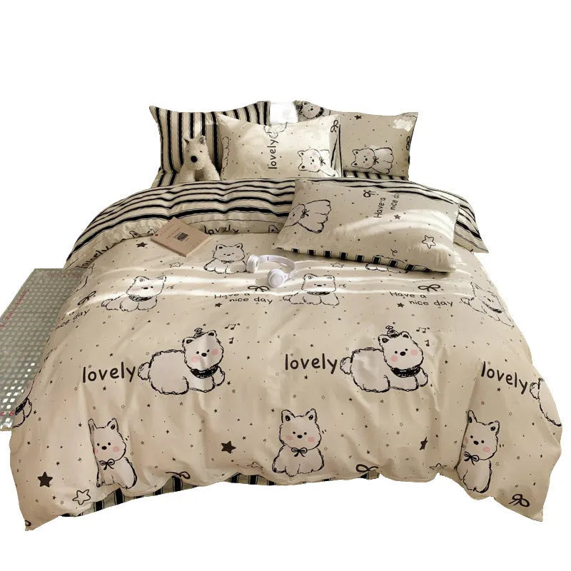 Cartoon dog pattern 100% cotton duvet cover and pillowcases on a single bed with a fitted sheet.
