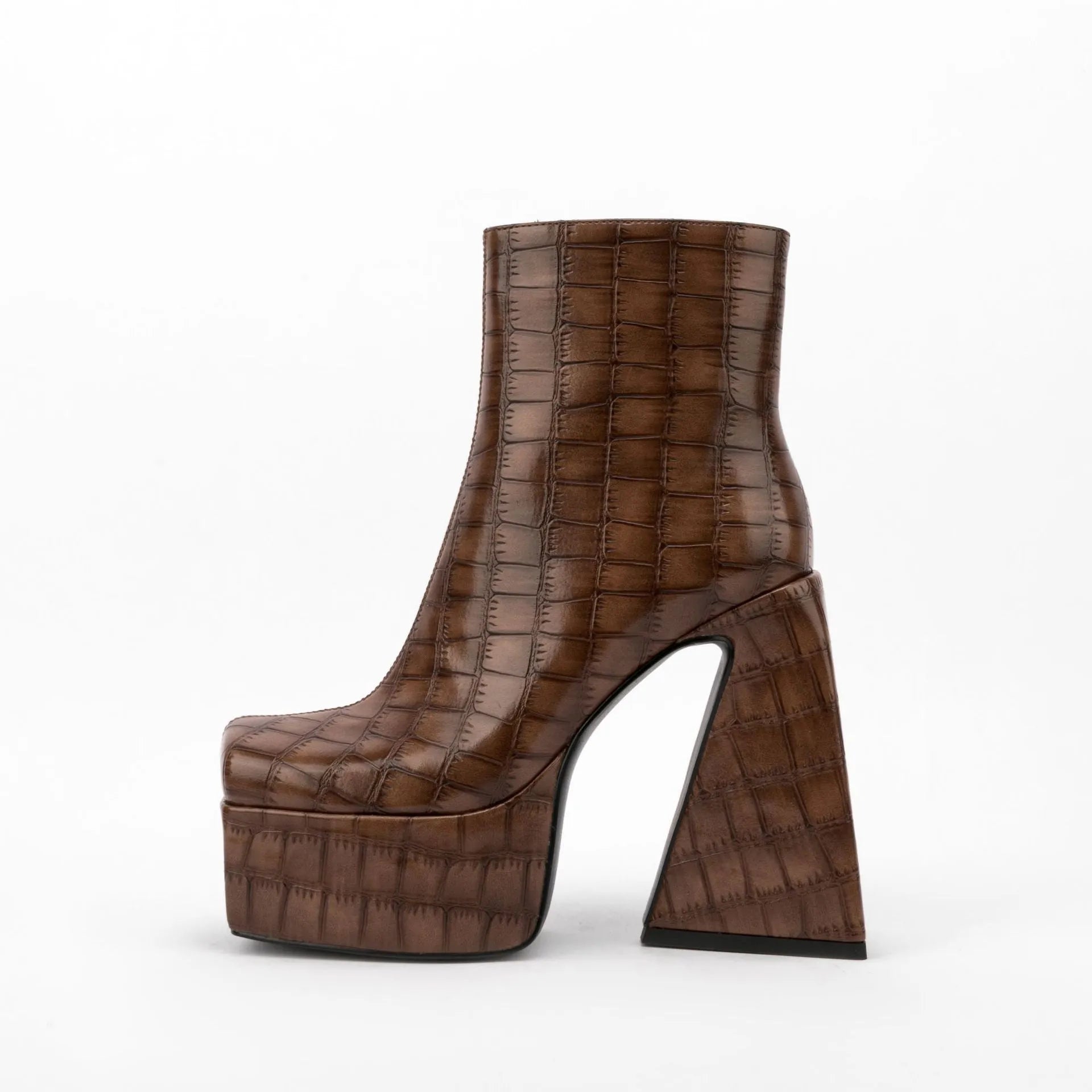 Women's ankle boot with a super high heel in a solid beige colour, made from artificial PU.