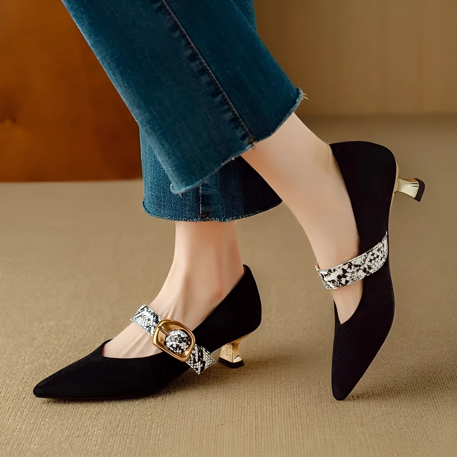 Women's black French pointed toe stiletto heels with buckle fastening and 3-5cm heel