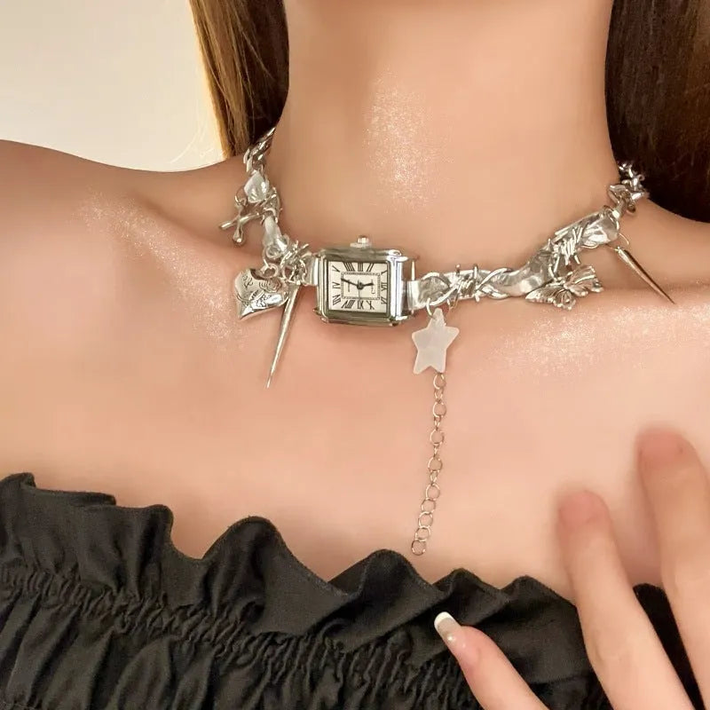 Dark style multi-layer cross necklace with twin clavicle chains showing electroplated alloy construction