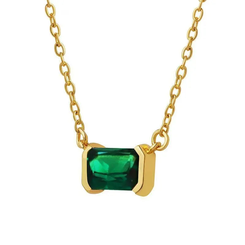 Women's gold geometric pendant necklace with quadrilateral design and inset cubic zirconia stones on chain