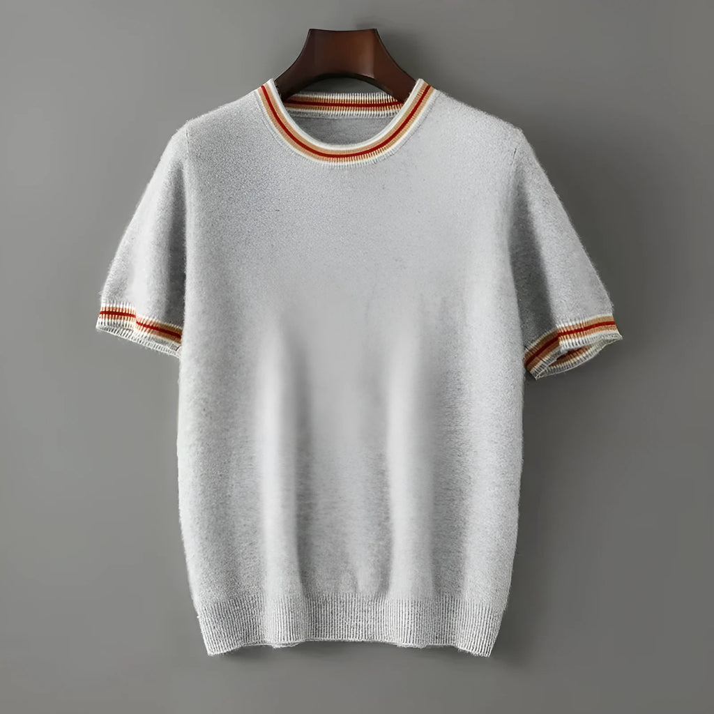 Men's grey pure wool short sleeve round neck sweater laid flat.