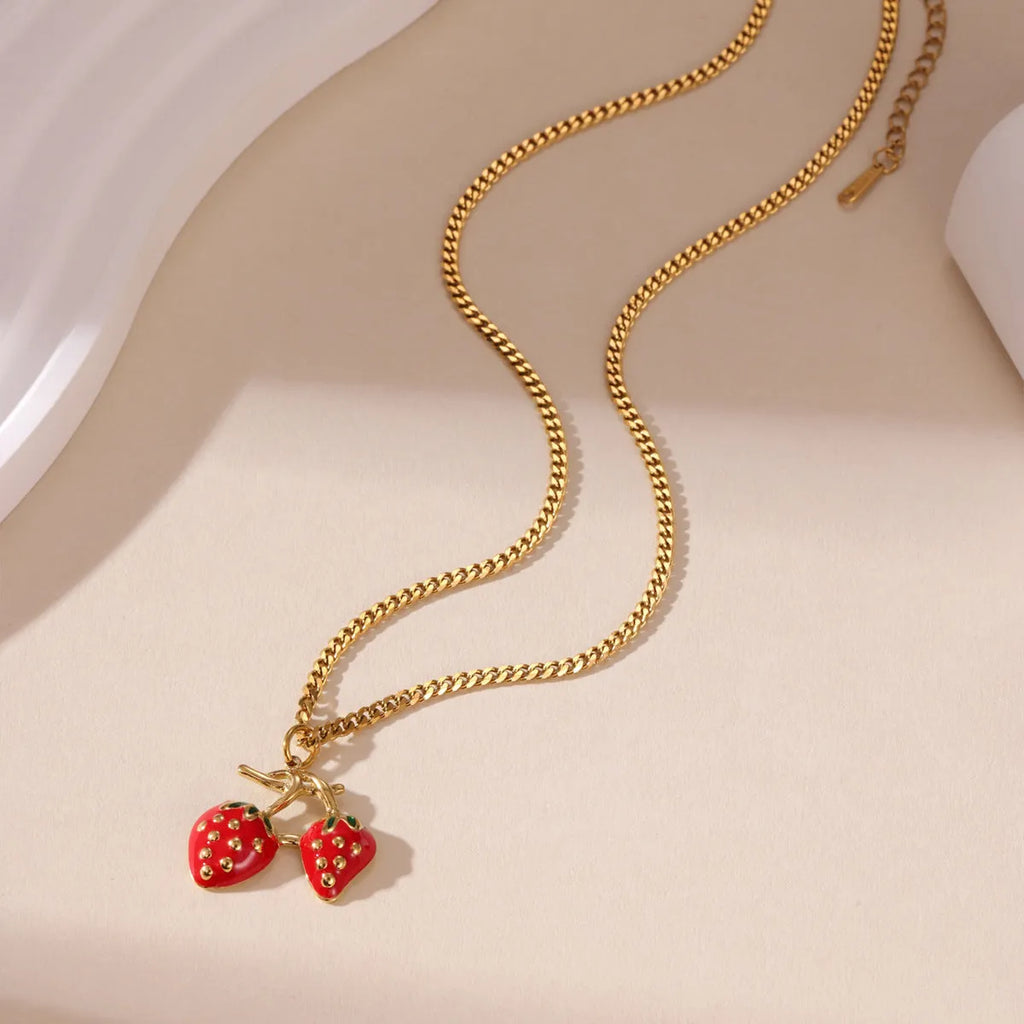 Stainless steel necklace with a strawberry fruit pendant in red or white gradient finish