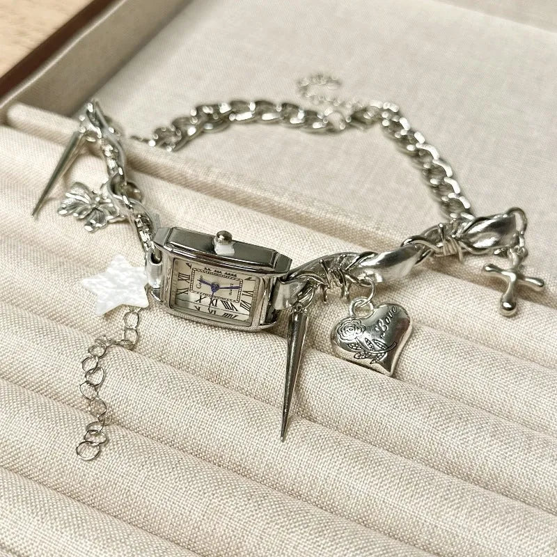 Dark style multi-layer cross necklace with twin clavicle chains showing electroplated alloy construction