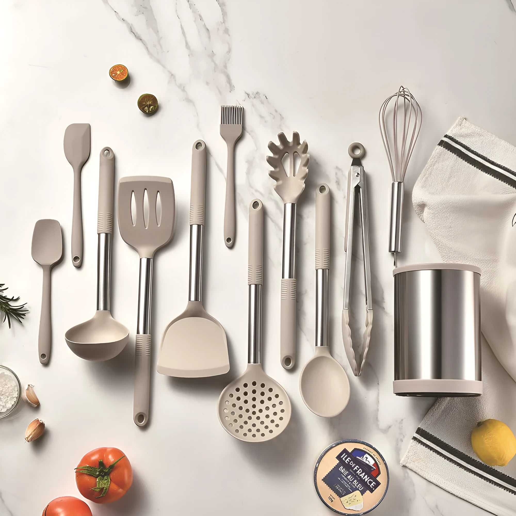 Silicone kitchen utensil set with twelve tools in a rotating white storage caddy on a counter.
