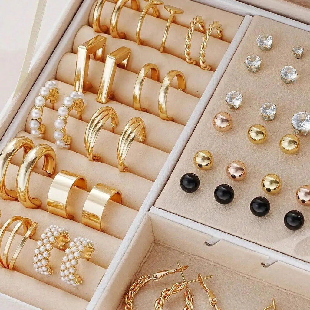 108 geometric pearl earrings in gold and yellow electroplated alloy arranged in combination set