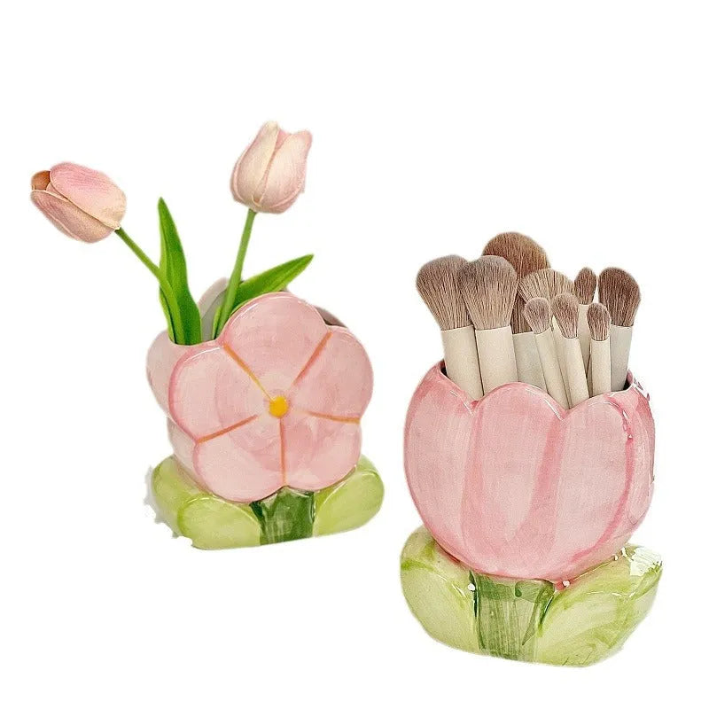 Ceramic pen holder storage box with floral pattern decoration on desktop