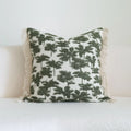 Green cotton and linen hotel sample room pillow with decorative tassel beading in stripe and plant patterns