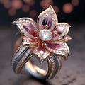 Gold-coloured alloy flower ring for women with lily design, shown in sizes 6 to 10