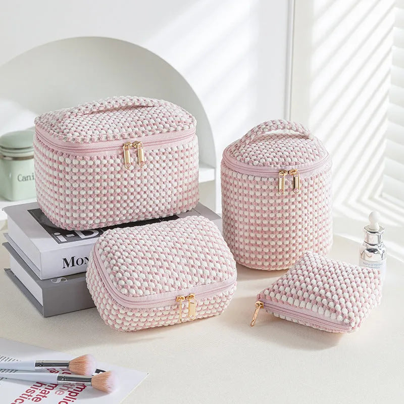 Flannelette makeup bag four-piece set in blue with dots pattern, showing cube-style polyester bags