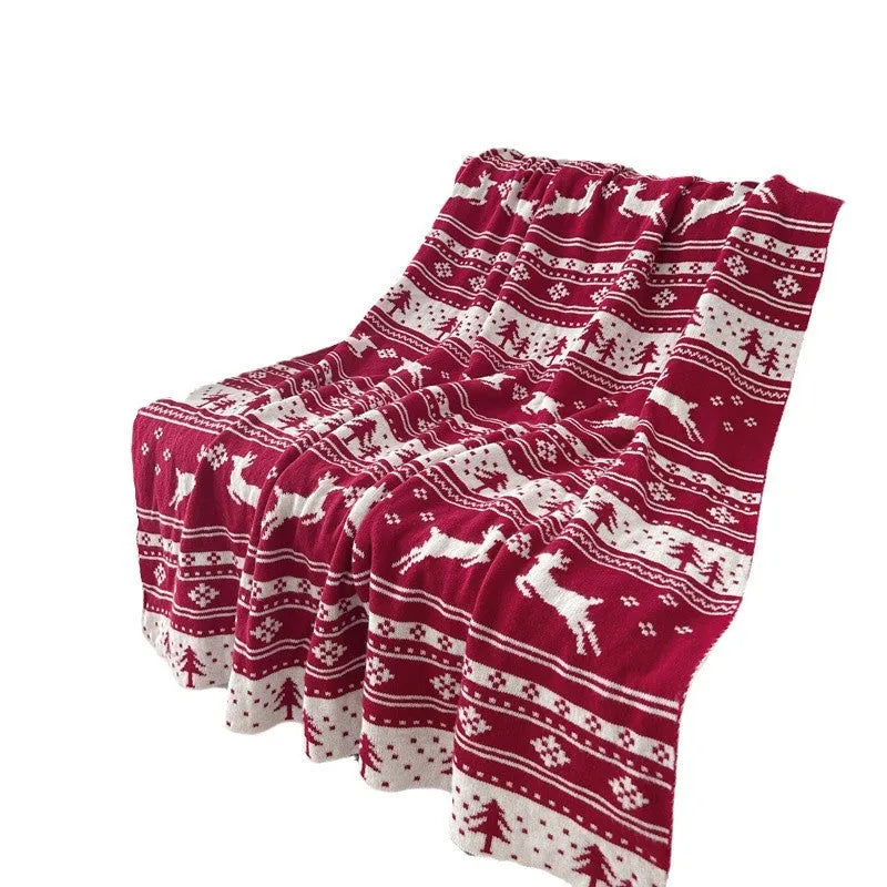 Personalised acrylic Christmas blanket showing reindeer and snowflake print options in two sizes.