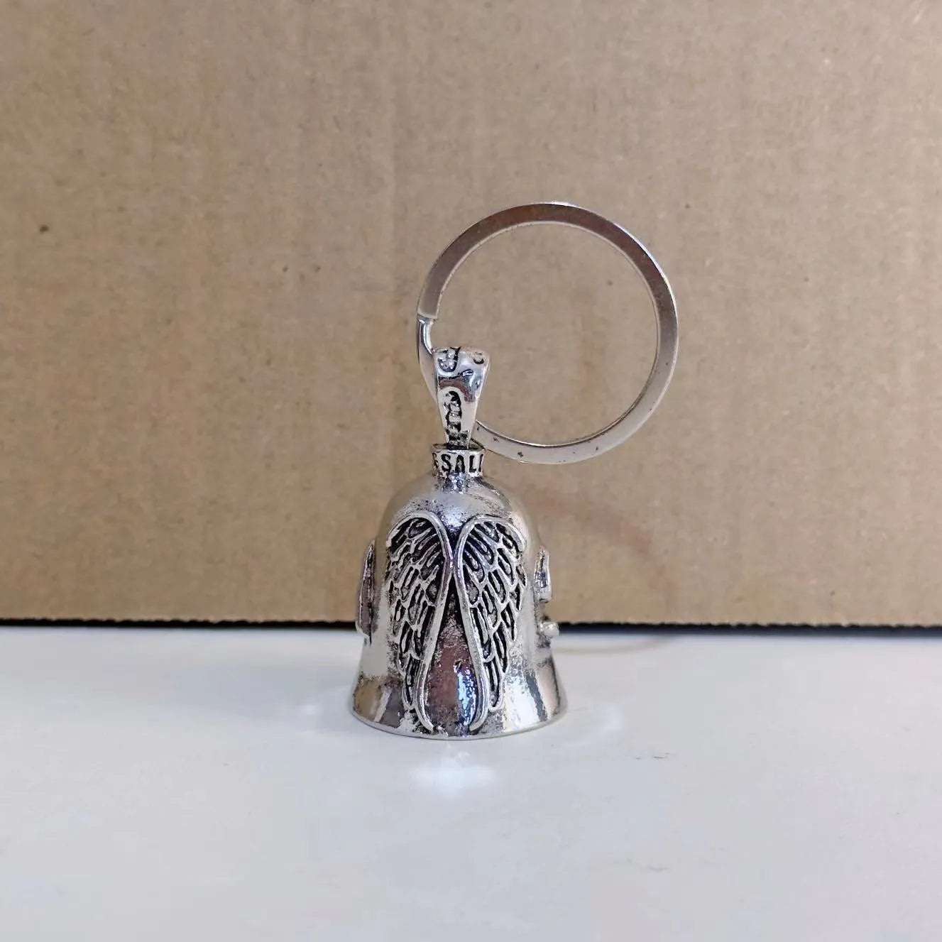 Vintage angel feather design necklace and matching keychain set in white alloy metal.