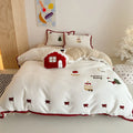 Winter Christmas themed bedding four-piece set with heart cartoon designs on thickened cashmere polyester fabric