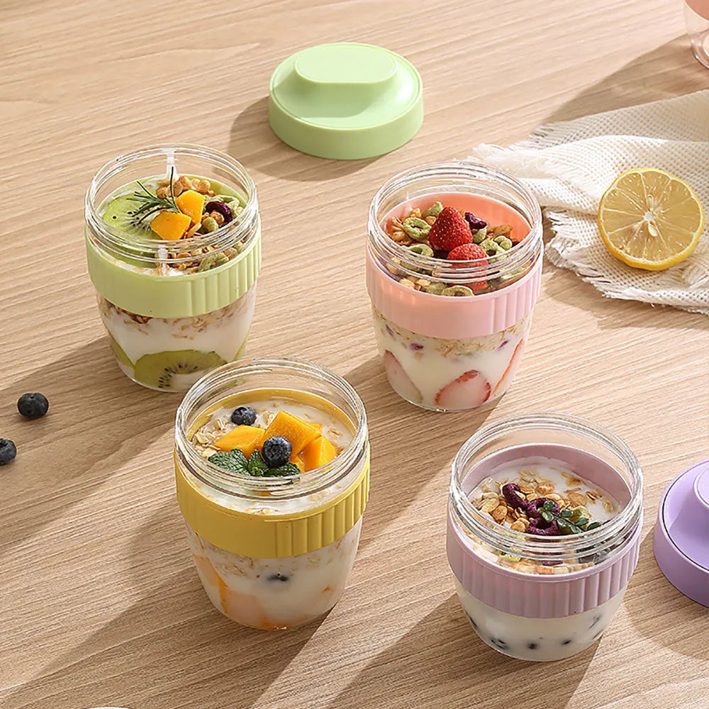 Modern simplicity plastic salad cup with lid and spoon in green, shown next to purple and pink options.
