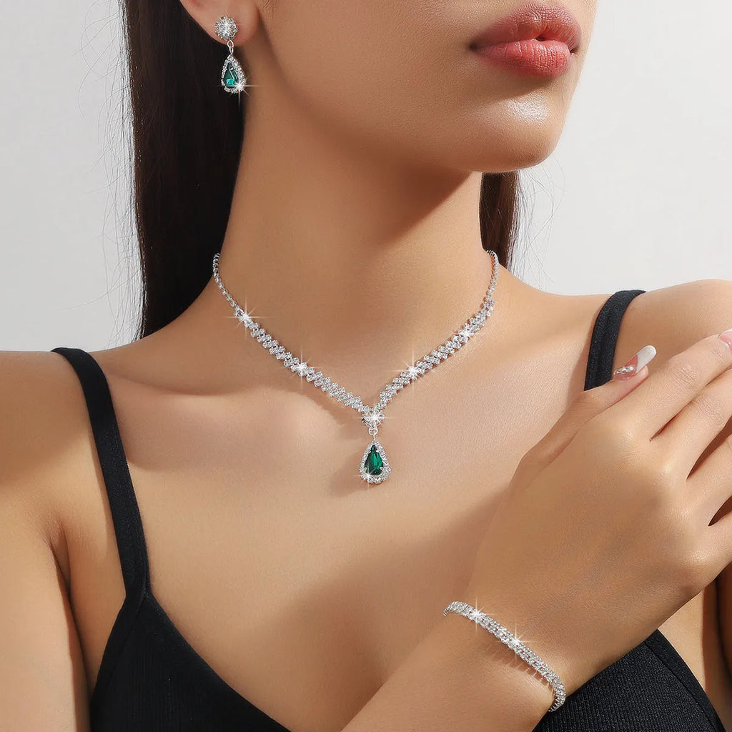 Claw chain necklace and earrings set with rhinestone drop elements in multiple colour options