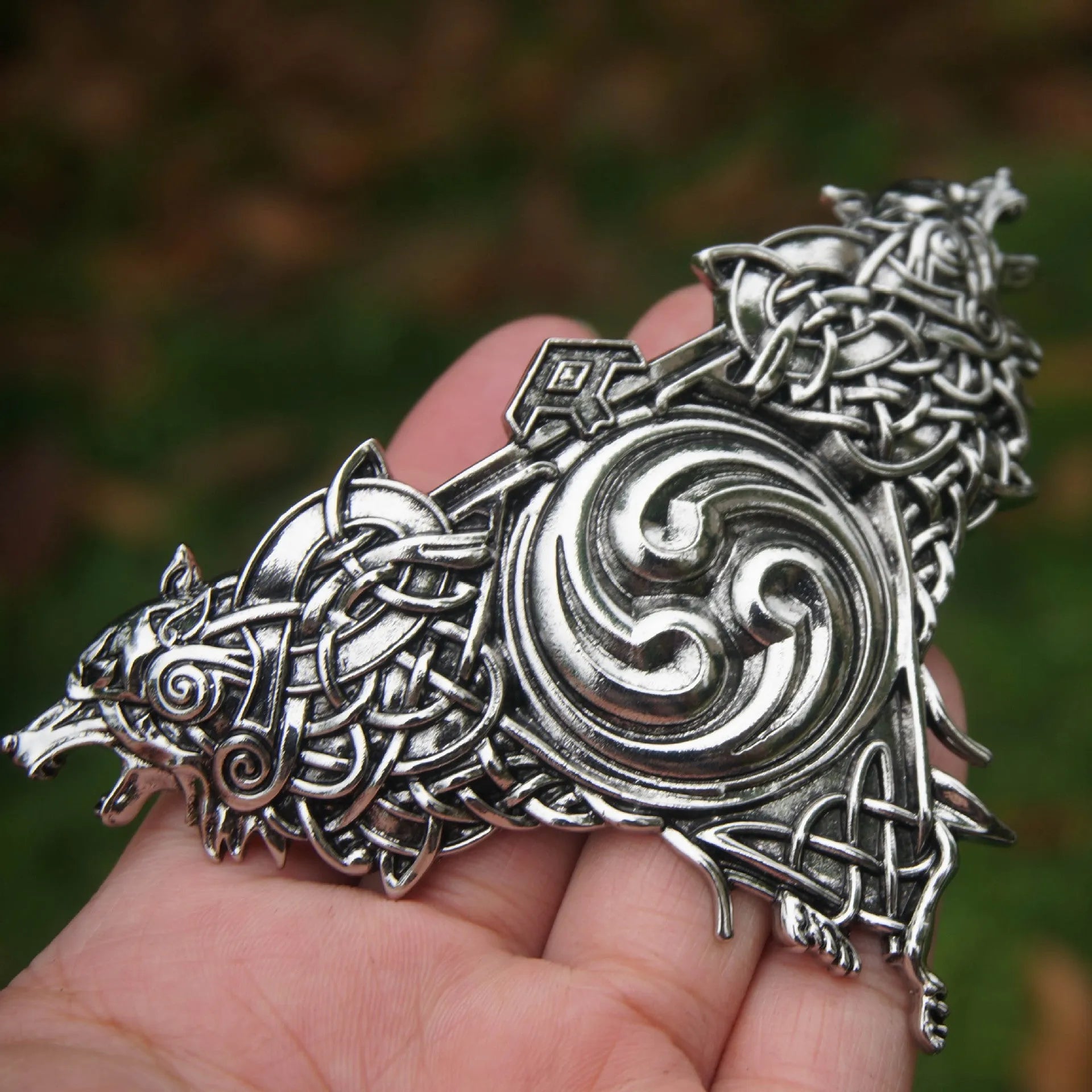 Women's Nordic retro double wolf hair clip in silver alloy on a light background