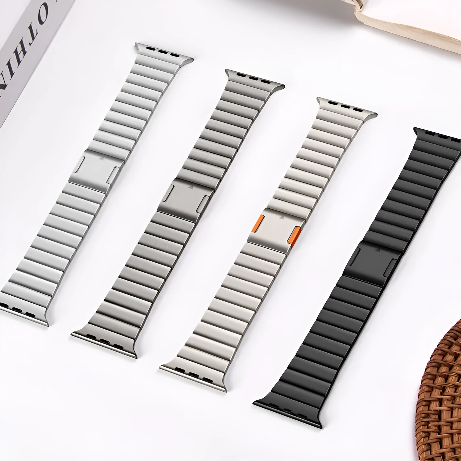 Stainless steel Apple Watch strap with magnetic clasp in silver, black, titanium, or gold colour options