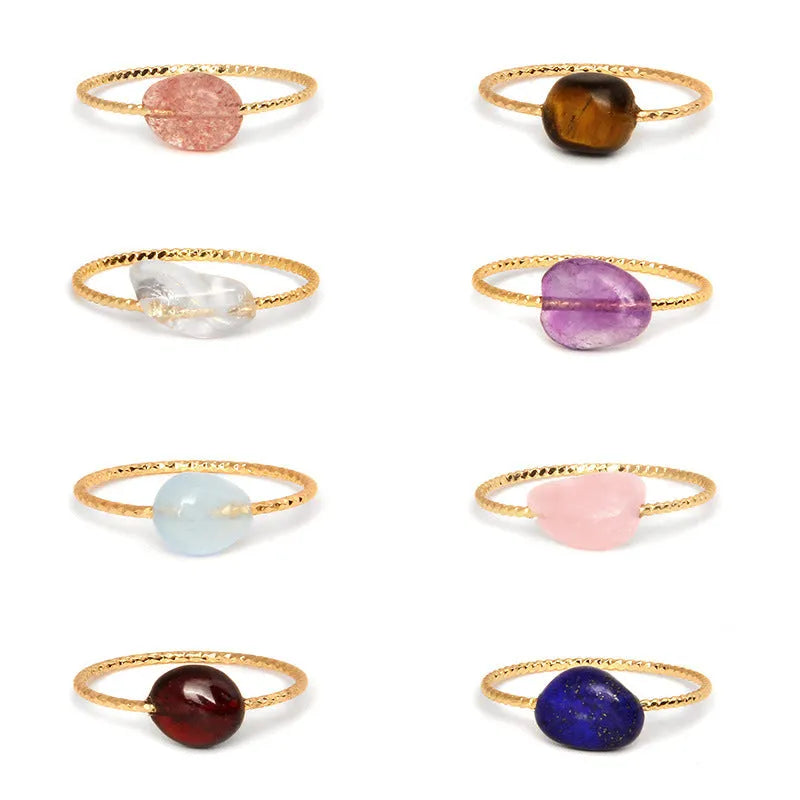 A women's ring featuring a geometric design set with a coloured agate stone.