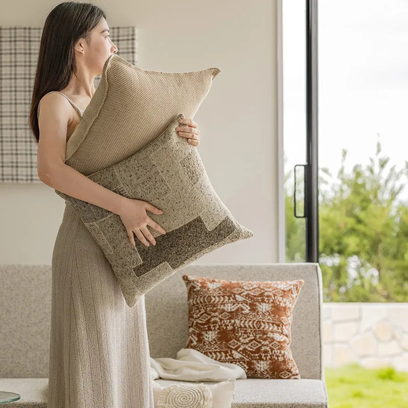 Square 45x45cm sofa cushion pillow in a solid colour and an abstract red-brown patterned option.