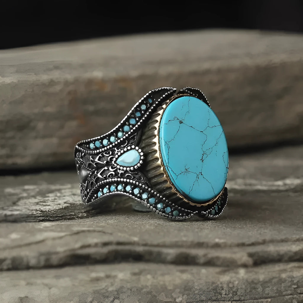 Men's antique silver alloy ring with turquoise decorative detail on a circular band