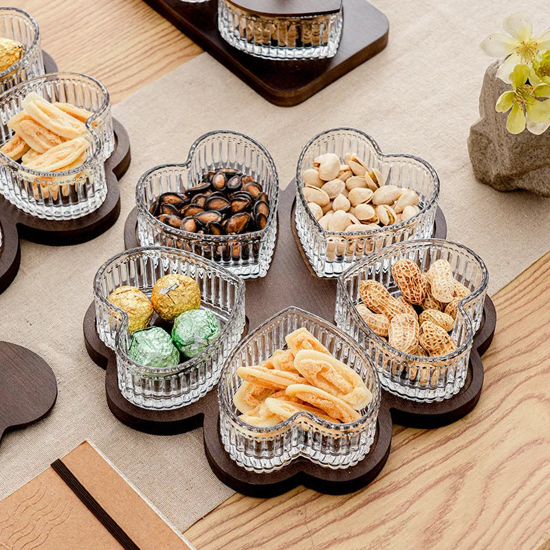 Glass serving platter with heart-shaped lids in a 4-grid configuration on a table