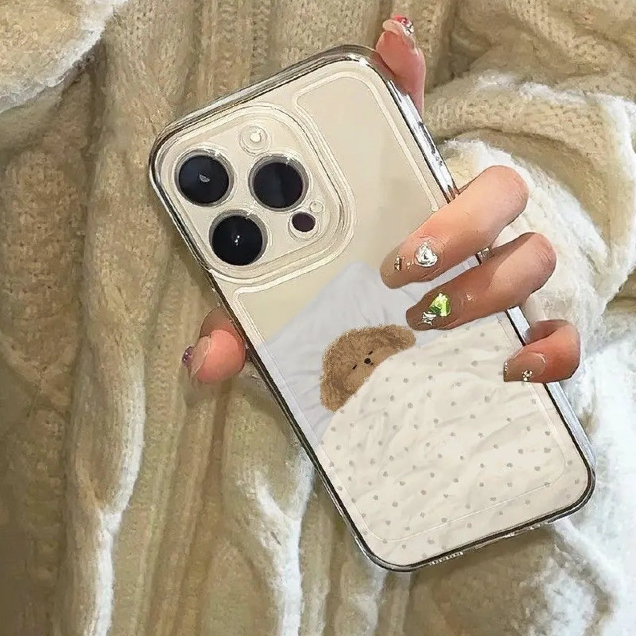 Transparent TPU phone case for Apple iPhone with a sleeping cat pattern on a clear background.