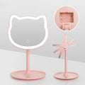 Pink rechargeable makeup mirror with fill light on a desk, ABS frame, aluminium mirror, size 14cm x 18cm