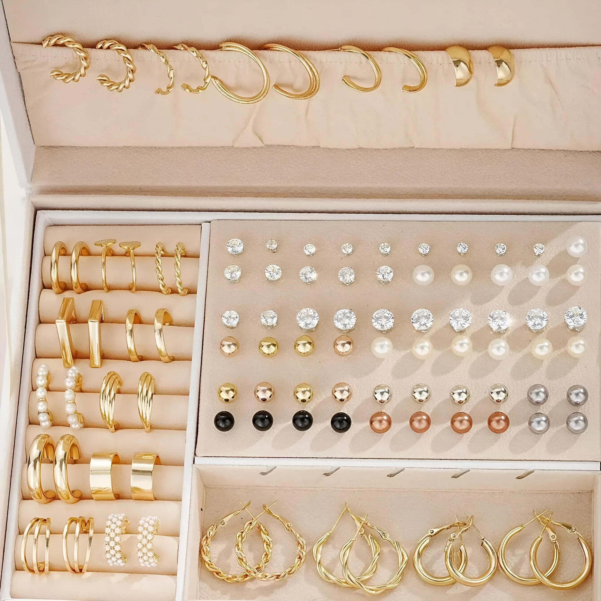 108 geometric earrings in gold and yellow electroplated finishes with round decorative elements