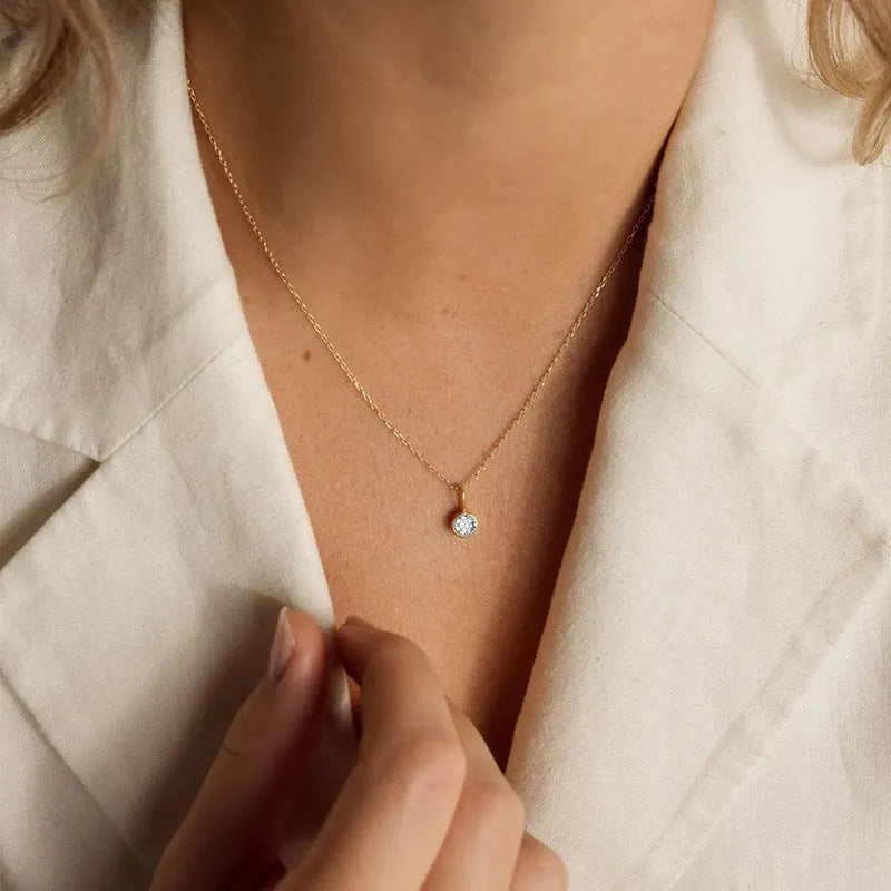 Entry Lux stainless steel U-shaped rhinestone pendant necklace in golden finish with month colour option