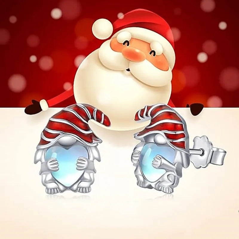 Women's silver-toned heart-shaped earrings with a Santa Claus decoration.